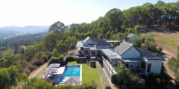 An aerial shot of our Porpunkah accommodation 215 Mt Buffalo showing the pool house and the Buffalo King Studio