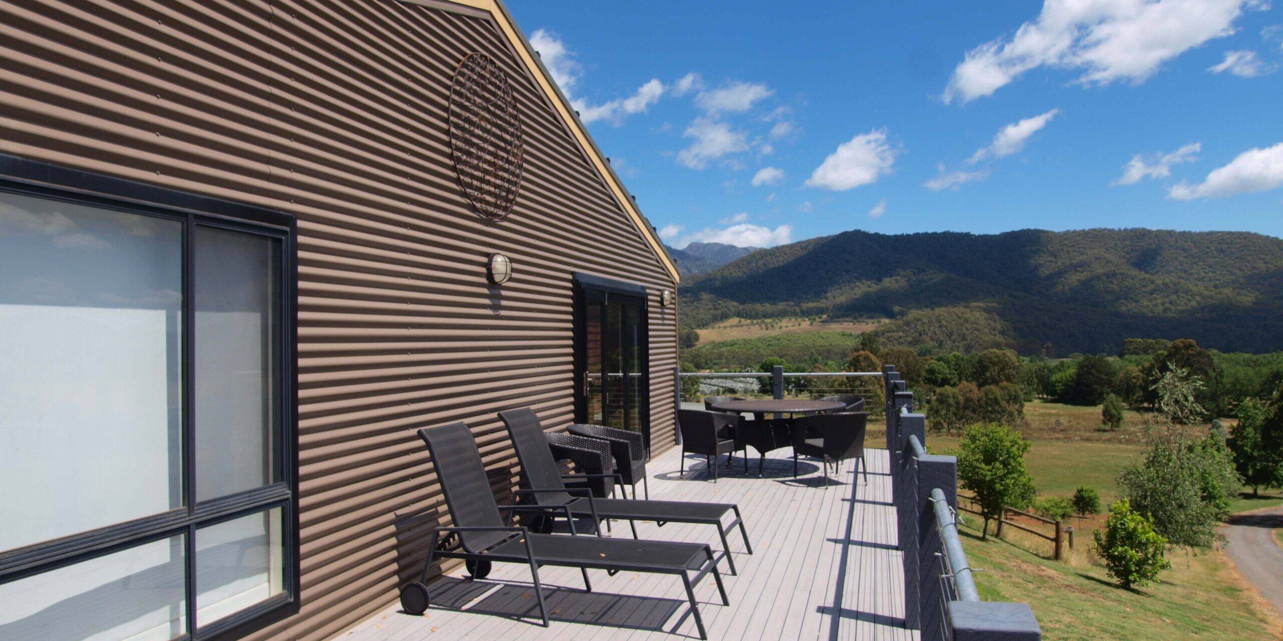 Mad on the Buckland Verandah showing the view