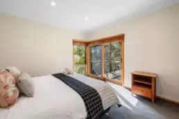 The main bedroom at 215 Mt Buffalo Pool House. A family friendly and pet friendly accommodation in Porepunkah.
