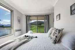 The upstairs main bedroom at Dreaming of the Buckland. Accommodation in the Buckland Valley